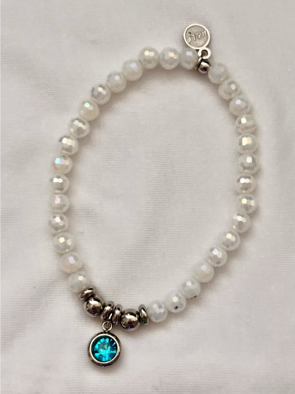 White Beaded Bracelet with Blue Crystal Charm by